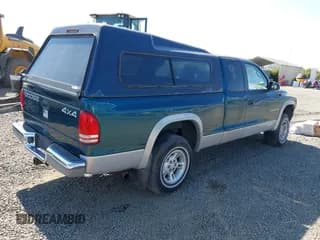 ✅ 1999 Dodge Dakota SLT • VIN: 1B7GG22Y2XS157214 • Lot: 39776504. Wystawiony na IAAI z przebiegiem 144 928 mil. Bezpłatny archiwum sprzedaży aukcyjnych z USA i szczegółowy raport historii pojazdu na DreamBid. Zdjęcie 4.