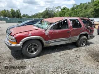 1998 Chevrolet Blazer LS with VIN 1GNCS13WXW2135178, listed as a Copart auction lot 60101125 with Not provided miles and Salvage title. Bid and sale history available at DreamBid. Image 1.