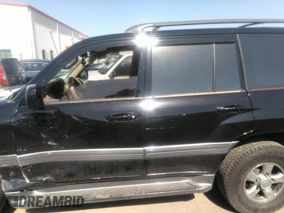 ✅ 2001 Toyota Land Cruiser • VIN: JTEHT05J512016563 • Lot: 41868193. Listed on IAAI with 247,653 mi. Free auction sales archive from the USA and detailed vehicle history report at DreamBid. Image 14.