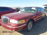 ✅ 1996 Lincoln Town Car Executive • VIN: 1LNLM81W5TY665786 • Lot: 42337707. Listed on IAAI with 110,403 mi. Free auction sales archive from the USA and detailed vehicle history report at DreamBid. Image 2.