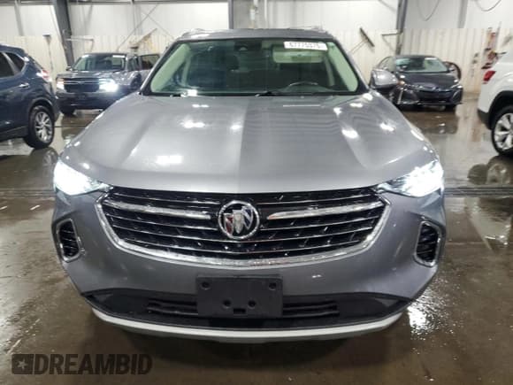 ✅ 2021 Buick Envision Essence • VIN: LRBFZPR47MD048610 • Lot: 67775375. Listed on Copart with 48,404 mi. Free auction sales archive from the USA and detailed vehicle history report at DreamBid. Image 5.