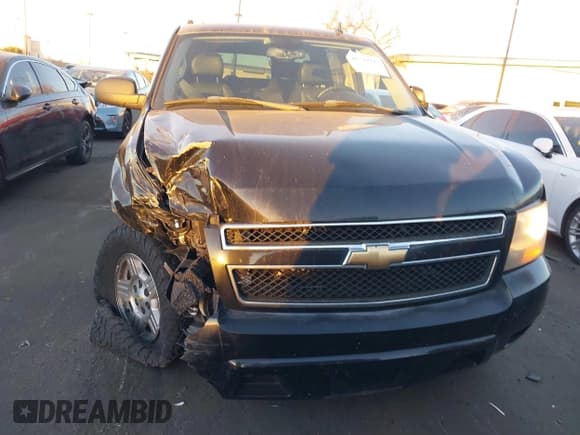 ✅ 2007 Chevrolet Suburban LT • VIN: 3GNFC16077G248080 • Lot: 41289912. Listed on IAAI with 129,622 mi. Free auction sales archive from the USA and detailed vehicle history report at DreamBid. Image 14.