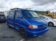 ✅ 2002 Volkswagen EuroVan MV • VIN: WV2NB47002H005993 • Lot: 41568379. Listed on IAAI with 143,133 mi. Free auction sales archive from the USA and detailed vehicle history report at DreamBid. Image 1.