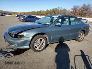 ✅ 2000 Mitsubishi Galant LS • VIN: 4A3AA56LXYE174881 • Лот: 79727154. Опубликован ранее на Copart с пробегом 106 001 миль. Бесплатный доступ к архиву аукционных продаж из США и подробный отчёт об истории автомобиля на DreamBid. Изображение 1.
