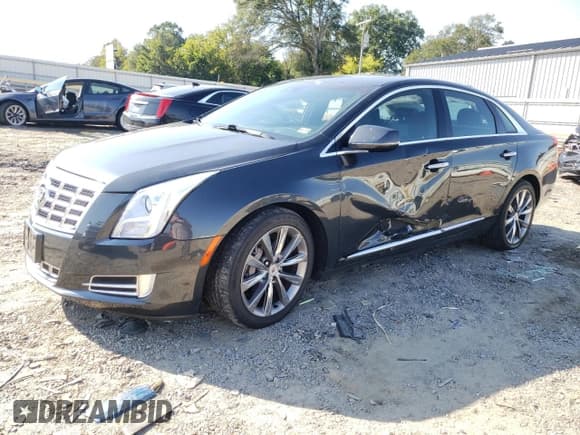 ✅ 2013 Cadillac XTS Luxury • VIN: 2G61R5S38D9193897 • Lot: 81551815. Listed on Copart with 99,662 mi. Free auction sales archive from the USA and detailed vehicle history report at DreamBid. Image 1.