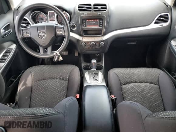 2013 Dodge Journey American Value with VIN 3C4PDCAB0DT575812, listed as a Copart auction lot 86771425 with 113,450 mi miles and Salvage title. Bid and sale history available at DreamBid. Image 8.