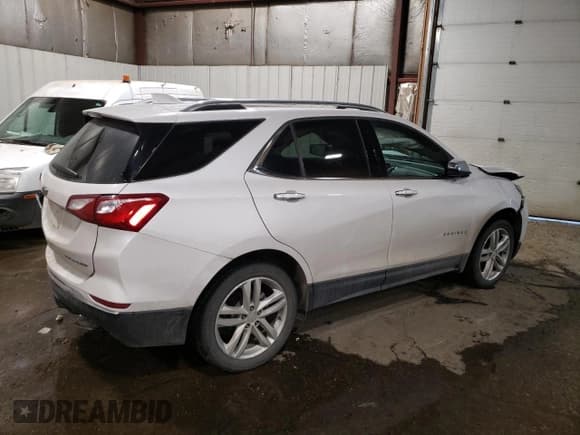 ✅ 2020 Chevrolet Equinox Premier • VIN: 3GNAXYEX7LS724406 • Lot: 92469685. Wystawiony na Copart z przebiegiem 65 017 mil. Bezpłatny archiwum sprzedaży aukcyjnych z USA i szczegółowy raport historii pojazdu na DreamBid. Zdjęcie 3.