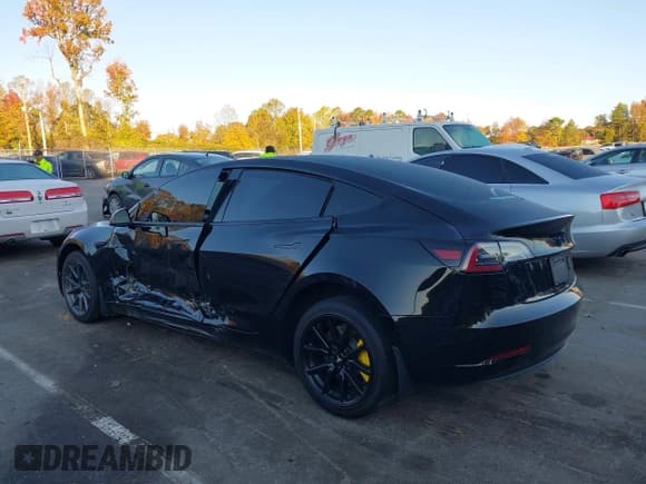 ✅ 2021 Tesla Model 3 Standard Range Plus • VIN: 5YJ3E1EA3MF915101 • Lot: 43580302. Listed on IAAI with 83,230 mi. Free auction sales archive from the USA and detailed vehicle history report at DreamBid. Image 3.