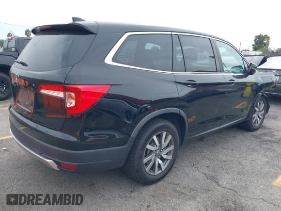 ✅ 2019 Honda Pilot EX-L • VIN: 5FNYF5H55KB037497 • Lot: 43255693. Listed on IAAI with 61,314 mi. Free auction sales archive from the USA and detailed vehicle history report at DreamBid. Image 4.