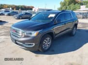 ✅ 2017 GMC Acadia SLE • VIN: 1GKKNLLA1HZ150369 • Lot: 43464973. Listed on IAAI with 62,023 mi. Free auction sales archive from the USA and detailed vehicle history report at DreamBid. Image 2.