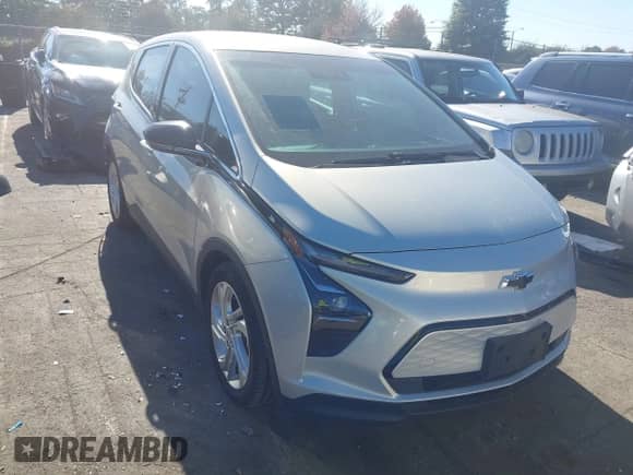 ✅ 2023 Chevrolet Bolt EV 1LT • VIN: 1G1FW6S07P4180386 • Lot: 43488676. Listed on IAAI with 32,179 mi. Free auction sales archive from the USA and detailed vehicle history report at DreamBid. Image 1.