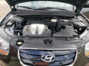 ✅ 2011 Hyundai Santa Fe Limited • VIN: 5XYZK4AG2BG002723 • Lot: 76418934. Listed on Copart with 123,592 mi. Free auction sales archive from the USA and detailed vehicle history report at DreamBid. Image 13.