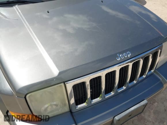 ✅ 2007 Jeep Commander Sport • VIN: 1J8HG48P87C647870 • Lot: 42185954. Listed on IAAI with 269,402 mi. Free auction sales archive from the USA and detailed vehicle history report at DreamBid. Image 6.