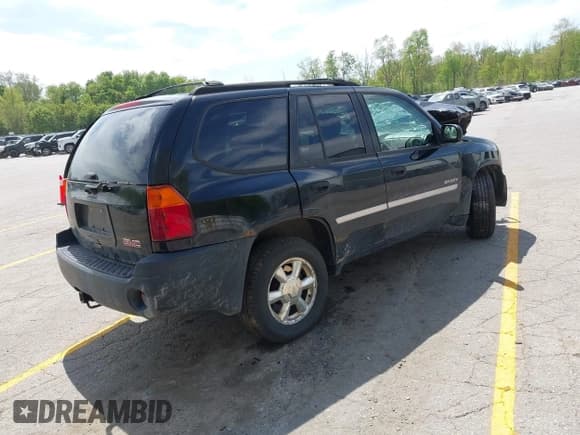 ✅ 2006 GMC Envoy SLE • VIN: 1GKDT13S562240769 • Lot: 42255973. Listed on IAAI with 183,423 mi. Free auction sales archive from the USA and detailed vehicle history report at DreamBid. Image 4.