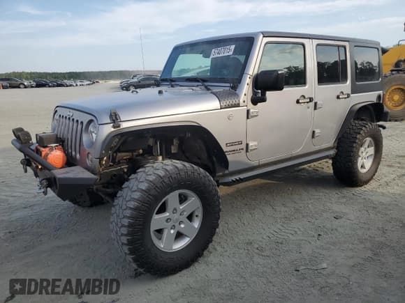✅ 2016 Jeep Wrangler Unlimited Sport • VIN: 1C4BJWDG2GL185774 • Lot: 57407015. Listed on Copart with 124,568 mi. Free auction sales archive from the USA and detailed vehicle history report at DreamBid. Image 1.