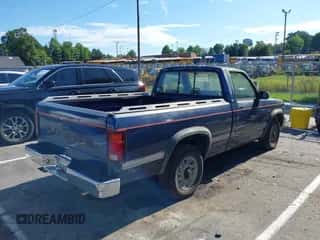 1992 Dodge Dakota SLT z VIN 1B7FL26X9NS643377, wystawiony jako IAAI lot #42844829 z przebiegiem 191 961 mil mil oraz . Historia ofert i sprzedaży dostępna na DreamBid. Obrazek 4.