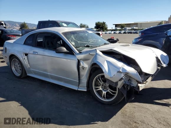 ✅ 2000 Ford Mustang • VIN: 1FAFP4048YF221988 • Lot: 82727145. Listed on Copart with Not provided. Free auction sales archive from the USA and detailed vehicle history report at DreamBid. Image 4.