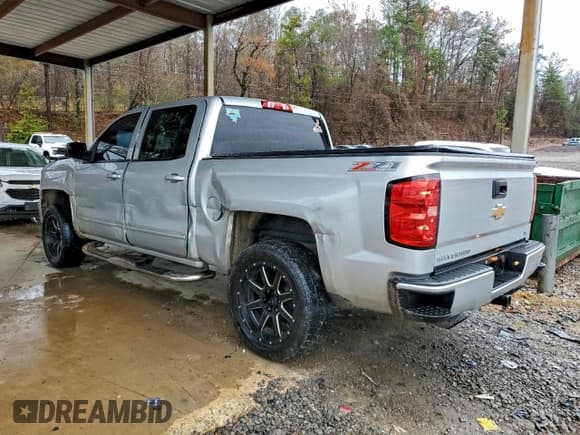 ✅ 2016 Chevrolet Silverado 1500 LT • VIN: 3GCUKREC6GG141969 • Lot: 94066935. Wystawiony na Copart z przebiegiem 186 603 mil. Bezpłatny archiwum sprzedaży aukcyjnych z USA i szczegółowy raport historii pojazdu na DreamBid. Zdjęcie 2.