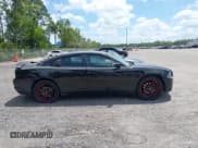 ✅ 2013 Dodge Charger SXT Plus • VIN: 2C3CDXJG1DH584579 • Lot: 42128401. Listed on IAAI with 100,388 mi. Free auction sales archive from the USA and detailed vehicle history report at DreamBid. Image 13.