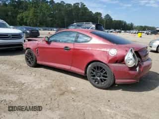 ✅ 2006 Hyundai Tiburon GS • VIN: KMHHM65D46U229462 • Лот: 70912605. Опубликован ранее на Copart с пробегом 169 009 миль. Бесплатный доступ к архиву аукционных продаж из США и подробный отчёт об истории автомобиля на DreamBid. Изображение 2.