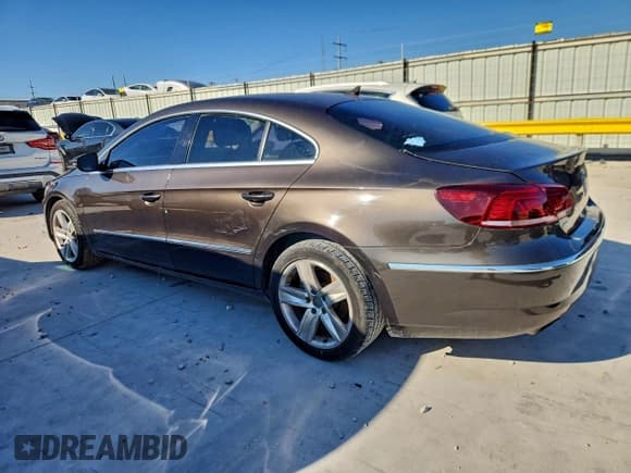 ✅ 2014 Volkswagen CC Sport • VIN: WVWBN7AN6EE503927 • Lot: 94918465. Listed on Copart with 145,639 mi. Free auction sales archive from the USA and detailed vehicle history report at DreamBid. Image 2.