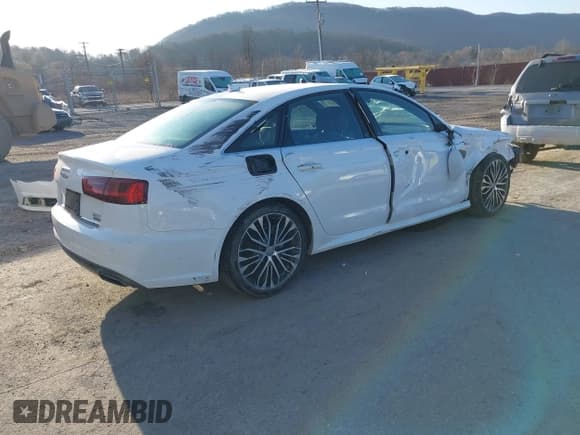 ✅ 2016 Audi A6 Prestige • VIN: WAUHGAFC2GN003319 • Lot: 41758455. Wystawiony na IAAI z przebiegiem 162 061 mil. Bezpłatny archiwum sprzedaży aukcyjnych z USA i szczegółowy raport historii pojazdu na DreamBid. Zdjęcie 4.