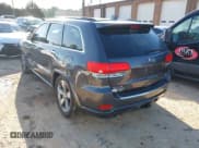 ✅ 2014 Jeep Grand Cherokee Overland • VIN: 1C4RJFCT3EC266101 • Lot: 39184826. Listed on IAAI with 141,512 mi. Free auction sales archive from the USA and detailed vehicle history report at DreamBid. Image 3.