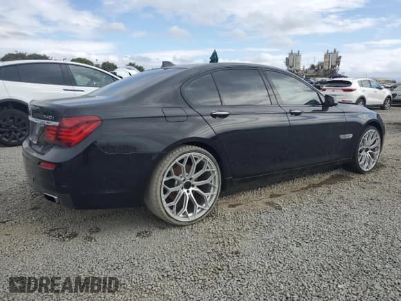 ✅ 2014 BMW 7 Series 740i • VIN: WBAYA6C51ED144289 • Lot: 82503675. Listed on Copart with 77,375 mi. Free auction sales archive from the USA and detailed vehicle history report at DreamBid. Image 3.
