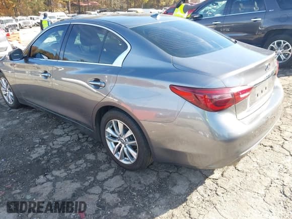 ✅ 2018 Infiniti Q50 Pure • VIN: JN1CV7AP7JM241442 • Lot: 43688806. Listed on IAAI with 107,840 mi. Free auction sales archive from the USA and detailed vehicle history report at DreamBid. Image 3.