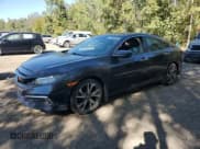 ✅ 2019 Honda Civic Touring • VIN: 2HGFC1F94KH101815 • Лот: 71849705. Опубликован ранее на Copart с пробегом 141 631 миль. Бесплатный доступ к архиву аукционных продаж из США и подробный отчёт об истории автомобиля на DreamBid. Изображение 1.