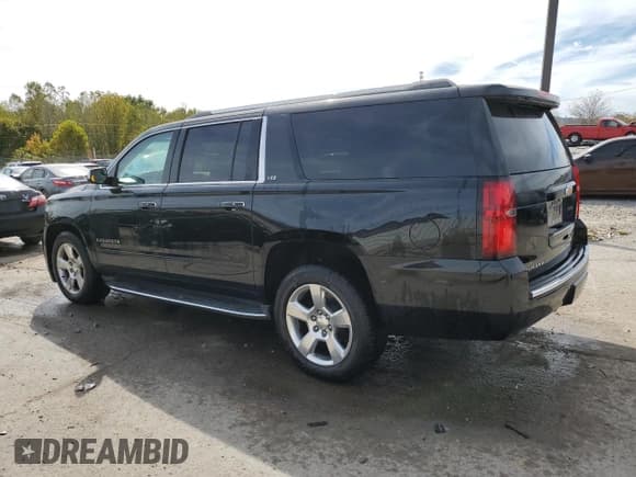 ✅ 2015 Chevrolet Suburban LTZ • VIN: 1GNSKKKC5FR296747 • Лот: 86699205. Опубликован ранее на Copart с пробегом 134 323 миль. Бесплатный доступ к архиву аукционных продаж из США и подробный отчёт об истории автомобиля на DreamBid. Изображение 2.