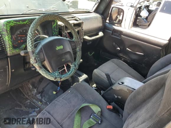 ✅ 2004 Jeep Wrangler Rubicon • VIN: 1J4FA69S74P769357 • Lot: 65425525. Wystawiony na Copart z przebiegiem 125 486 mil. Bezpłatny archiwum sprzedaży aukcyjnych z USA i szczegółowy raport historii pojazdu na DreamBid. Zdjęcie 8.