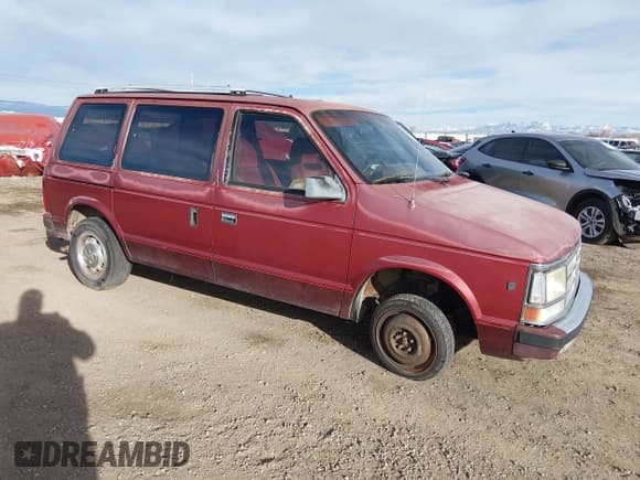 ✅ 1987 Dodge Caravan • VIN: 2B4FK5135HR236815 • Lot: 43882650. Listed on IAAI with 172,707 mi. Free auction sales archive from the USA and detailed vehicle history report at DreamBid. Image 1.