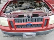 ✅ 2004 Ford Explorer Sport Trac XLS • VIN: 1FMZU67K74UA46795 • Lot: 51621905. Listed on Copart with Not provided. Free auction sales archive from the USA and detailed vehicle history report at DreamBid. Image 11.