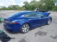 ✅ 2021 Tesla Model S Performance • VIN: 5YJSA1E43MF424593 • Lot: 42198084. Listed on IAAI with 74,546 mi. Free auction sales archive from the USA and detailed vehicle history report at DreamBid. Image 4.