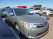 2013 Toyota Camry L with VIN 4T4BF1FK3DR310262, listed as a IAAI auction lot 43173695 with 113,948 mi miles and . Bid and sale history available at DreamBid. Image 1.