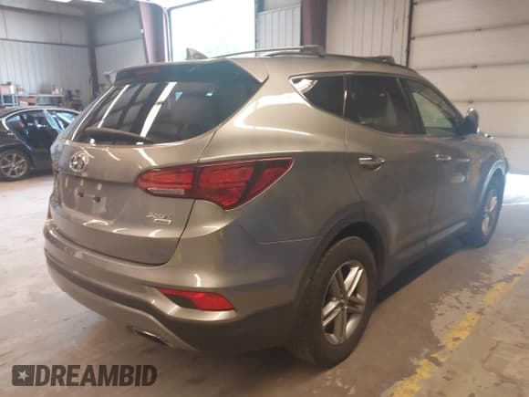 ✅ 2018 Hyundai Santa Fe 2.4L • VIN: 5NMZUDLB2JH072593 • Лот: 42846562. Опубликован ранее на IAAI с пробегом 56 789 миль. Бесплатный доступ к архиву аукционных продаж из США и подробный отчёт об истории автомобиля на DreamBid. Изображение 4.
