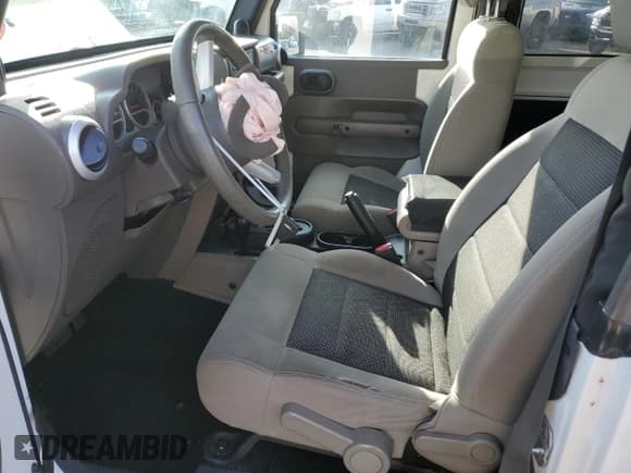 ✅ 2010 Jeep Wrangler Sahara • VIN: 1J4AA5D10AL181225 • Lot: 79696464. Listed on Copart with 90,139 mi. Free auction sales archive from the USA and detailed vehicle history report at DreamBid. Image 7.