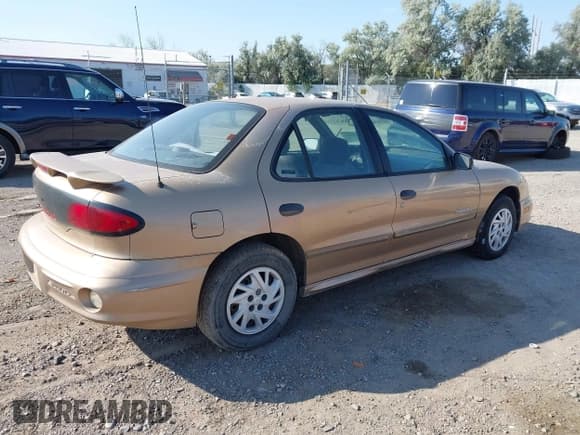 ✅ 2000 Pontiac Sunfire SE • VIN: 1G2JB5246Y7431932 • Lot: 42793631. Listed on IAAI with Not provided. Free auction sales archive from the USA and detailed vehicle history report at DreamBid. Image 4.