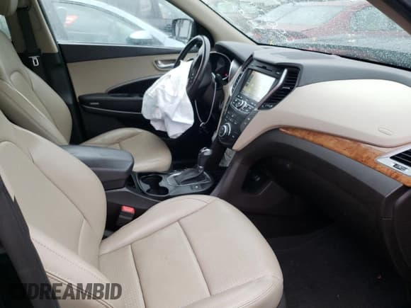 ✅ 2015 Hyundai Santa Fe • VIN: 5XYZWDLA0FG239150 • Лот: 65664442. Опубликован ранее на Copart с пробегом 107 911 миль. Бесплатный доступ к архиву аукционных продаж из США и подробный отчёт об истории автомобиля на DreamBid. Изображение 5.