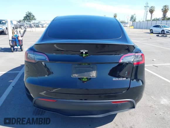 ✅ 2025 Tesla Model Y Performance • VIN: 7SAYGDEFXSF261145 • Lot: 42343916. Listed on IAAI with 7,575 mi. Free auction sales archive from the USA and detailed vehicle history report at DreamBid. Image 16.