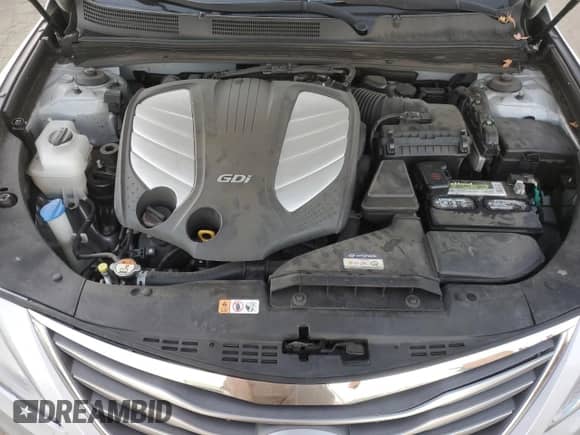 2016 Hyundai Azera z VIN KMHFG4JG4GA563397, wystawiony jako Copart lot #87879325 z przebiegiem 58 528 mil mil oraz Szkoda całkowita • Salvage title. Historia ofert i sprzedaży dostępna na DreamBid. Obrazek 12.