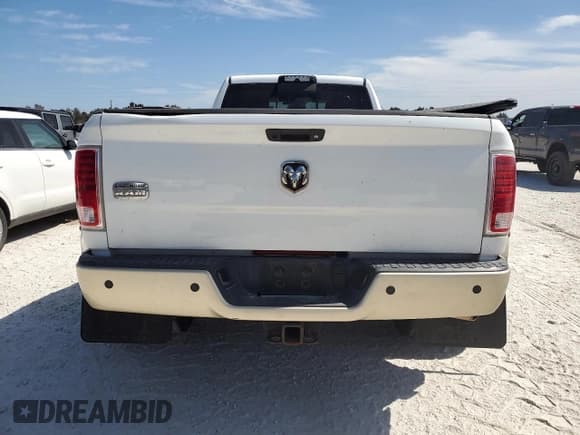 ✅ 2014 Ram 3500 • VIN: 3C63RPKL9EG238443 • Лот: 75286024. Опубликован ранее на Copart с пробегом 125 382 миль. Бесплатный доступ к архиву аукционных продаж из США и подробный отчёт об истории автомобиля на DreamBid. Изображение 6.