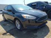 ✅ 2018 Ford Focus SE • VIN: 1FADP3FE8JL281651 • Lot: 43169650. Listed on IAAI with 69,451 mi. Free auction sales archive from the USA and detailed vehicle history report at DreamBid. Image 1.