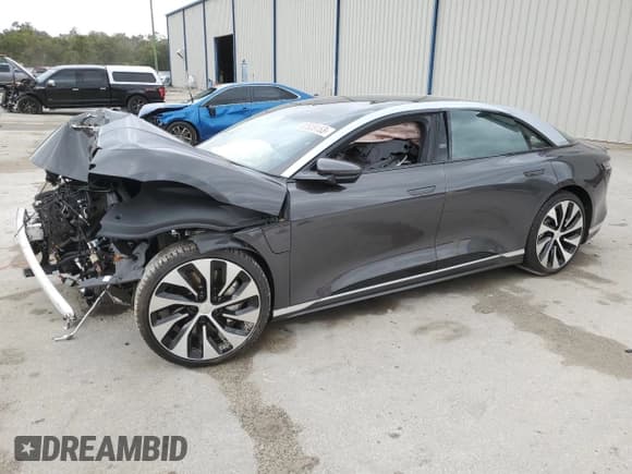 ✅ 2023 Lucid Air Touring • VIN: 50EA1TEA9PA005136 • Lot: 82828153. Wystawiony na Copart z przebiegiem Nie podano. Bezpłatny archiwum sprzedaży aukcyjnych z USA i szczegółowy raport historii pojazdu na DreamBid. Zdjęcie 1.