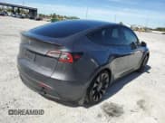 ✅ 2022 Tesla Model Y Performance • VIN: 7SAYGDEF6NF521271 • Lot: 92212045. Listed on Copart with 45,558 mi. Free auction sales archive from the USA and detailed vehicle history report at DreamBid. Image 3.