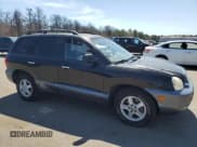 ✅ 2004 Hyundai Santa Fe GLS • VIN: KM8SC13E54U700457 • Lot: 53755855. Listed on Copart with 101,565 mi. Free auction sales archive from the USA and detailed vehicle history report at DreamBid. Image 4.