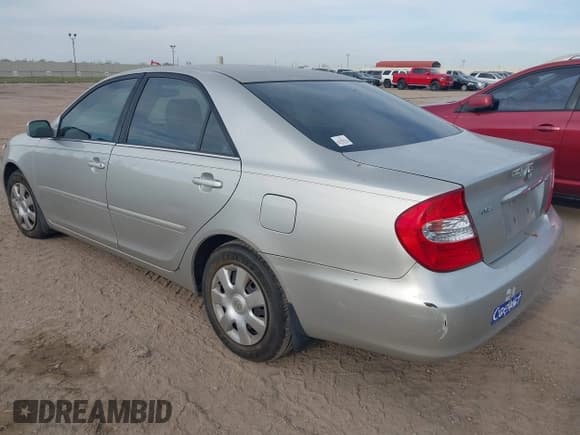 ✅ 2004 Toyota Camry LE • VIN: 4T1BE32KX4U808070 • Лот: 43841639. Опубликован ранее на IAAI с пробегом 194 823 миль. Бесплатный доступ к архиву аукционных продаж из США и подробный отчёт об истории автомобиля на DreamBid. Изображение 3.
