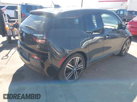 ✅ 2014 BMW i3 • VIN: WBY1Z2C58EV284967 • Lot: 41871692. Listed on IAAI with 63,670 mi. Free auction sales archive from the USA and detailed vehicle history report at DreamBid. Image 4.