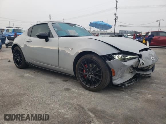 ✅ 2024 Mazda MX-5 Miata Club • VIN: JM1NDAL71R0607675 • Лот: 91052035. Опубликован ранее на Copart с пробегом 11 642 миль. Бесплатный доступ к архиву аукционных продаж из США и подробный отчёт об истории автомобиля на DreamBid. Изображение 4.